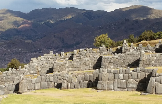 Massive stone walls of Sacsayhuaman overlook Cusco in Peru's Anden highlands. 