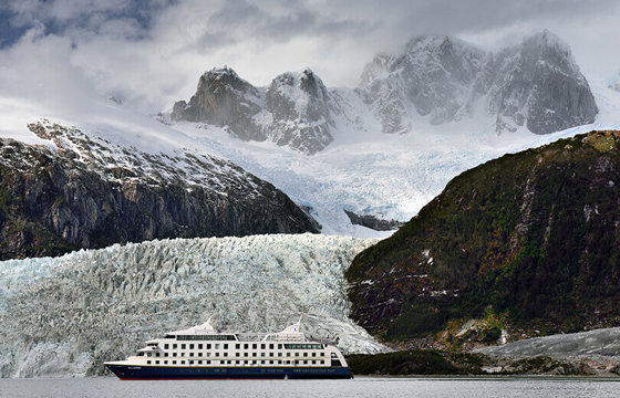 Sail close up to awe-inspiring glaciers as they crash into the sea