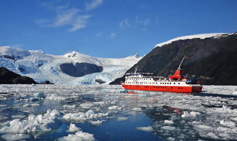 Skorpios III carving her way through an icefield