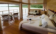 The master suite has expansive views of the jungle