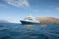 Santa Cruz II and sea kayaks