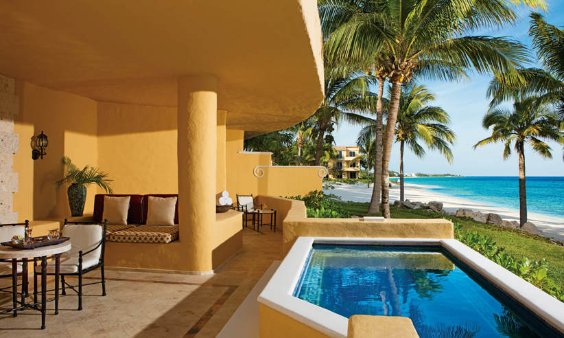 Private terrace with a plunge pool at Zoetry Paraiso de la Bonita Resort, Yucatan, overlooking the ocean with tropical views. 