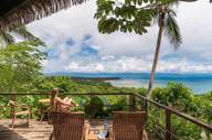 A peaceful retreat at Lapa Rios overlooks the lush Osa rainforest and sparkling Pacific horizon. 