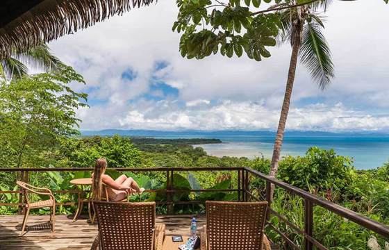 A peaceful retreat at Lapa Rios overlooks the lush Osa rainforest and sparkling Pacific horizon. 