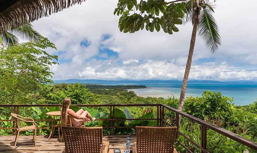 A peaceful retreat at Lapa Rios overlooks the lush Osa rainforest and sparkling Pacific horizon. 