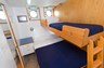 Twin cabin with an upper berth