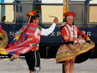 Traditional dance performance at the train platform before boarding the Andean Explorer. 