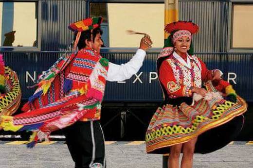 Traditional dance performance at the train platform before boarding the Andean Explorer. 