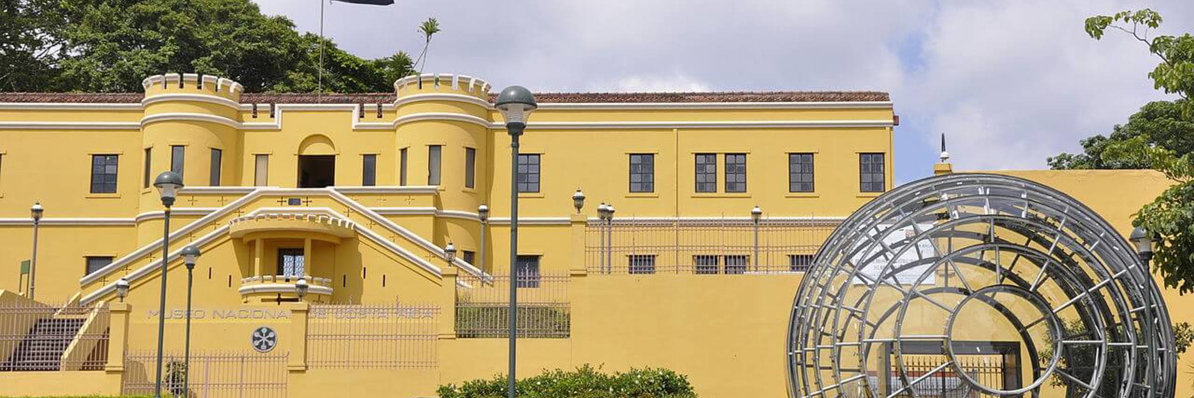 The striking yellow facade of the National Museum in San Jose, Costa Rica-an iconic landmark revealing the capital's cultural and historic charm. 