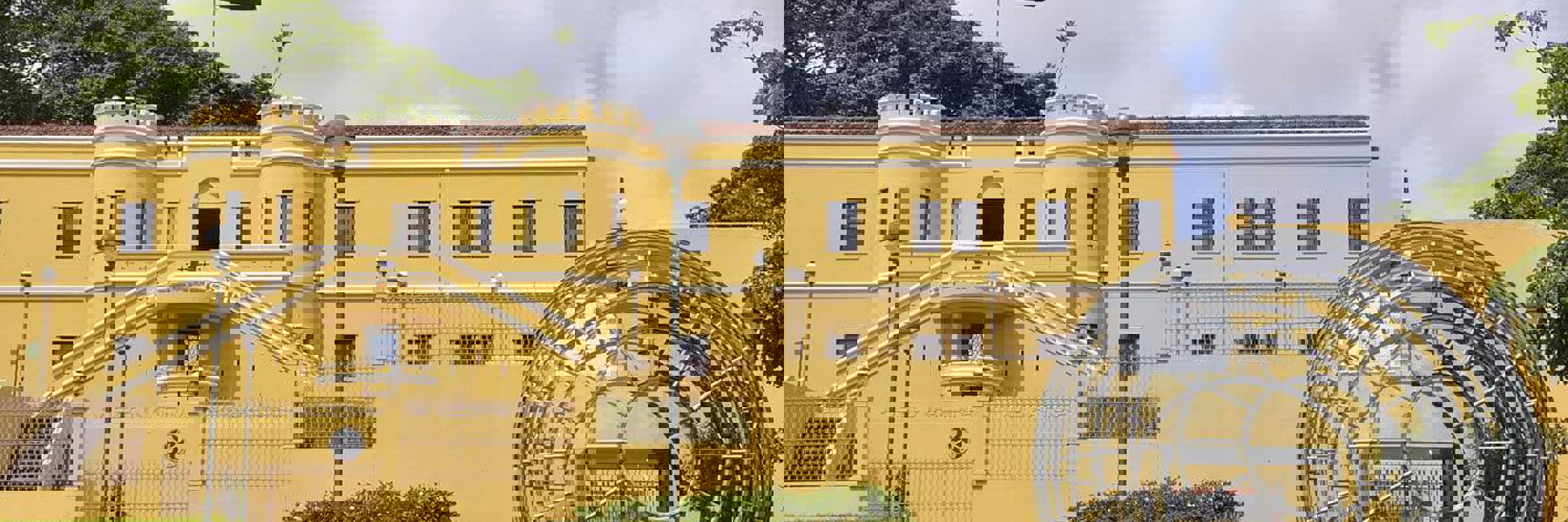 The striking yellow facade of the National Museum in San Jose, Costa Rica-an iconic landmark revealing the capital's cultural and historic charm. 