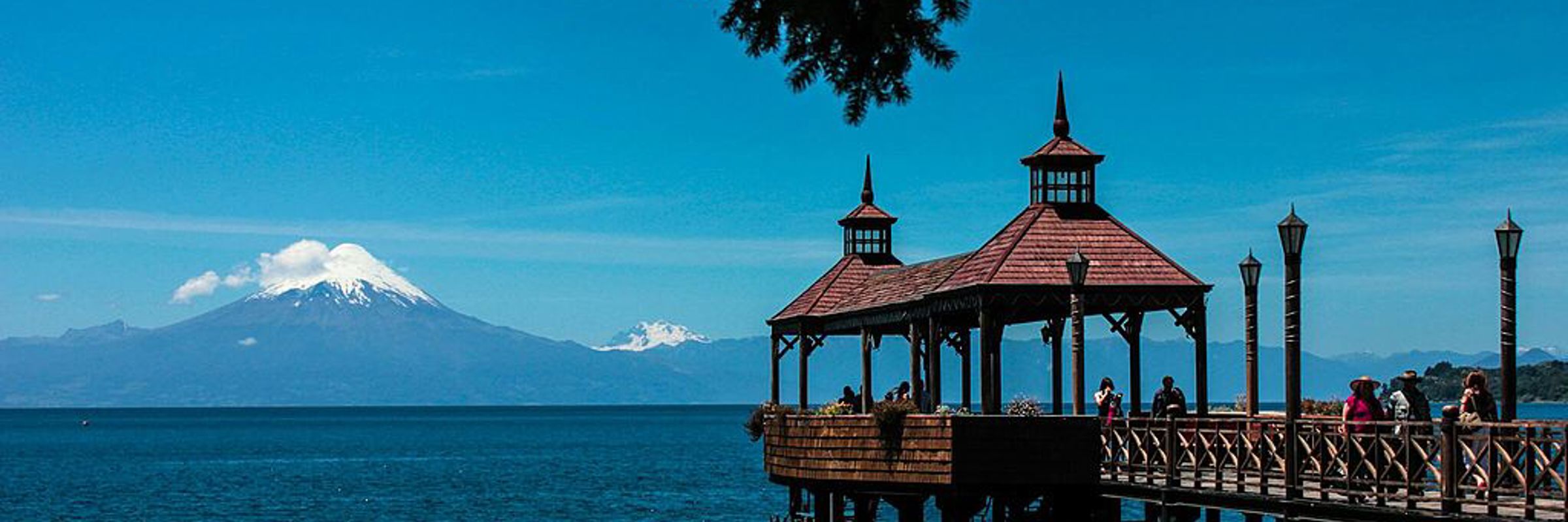 Pier over Lake Llanquihue with Osorno Volcano in the background near Puerto Varas, Chile. 