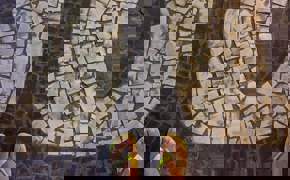 Iconic black and white mosaic sidewalk pattern of Copacabana in Rio de Janeiro. 