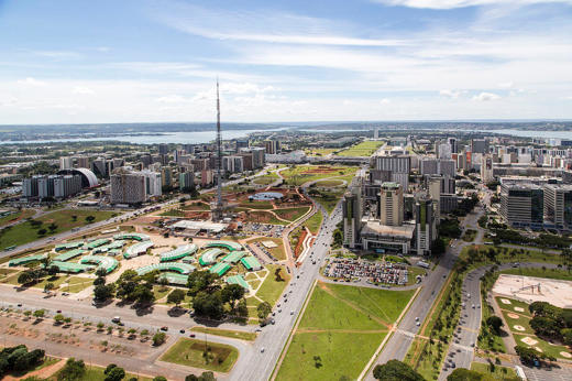 Aerial view of Brasilia's Esplanade of Ministries, showcasing modernist architecture and the city's organized layout. 