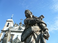 Stone prophet statue by Aleijadinho in front of the Basilica of Bom Jesus in  Congonhas, Minas Gerais, Brazil. 