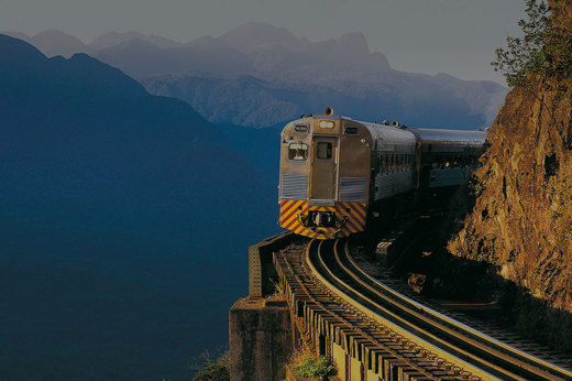 Serra Verde Express train winding through the lush mountains between Curitiba and Paranagua, Brazil. 