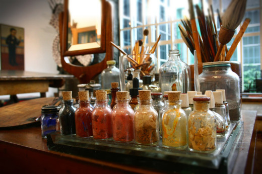 Frida Kahlo's studio with pigment jars and art materials at the Frida Kahlo Museum (Casa Azul) in Mexico City. 