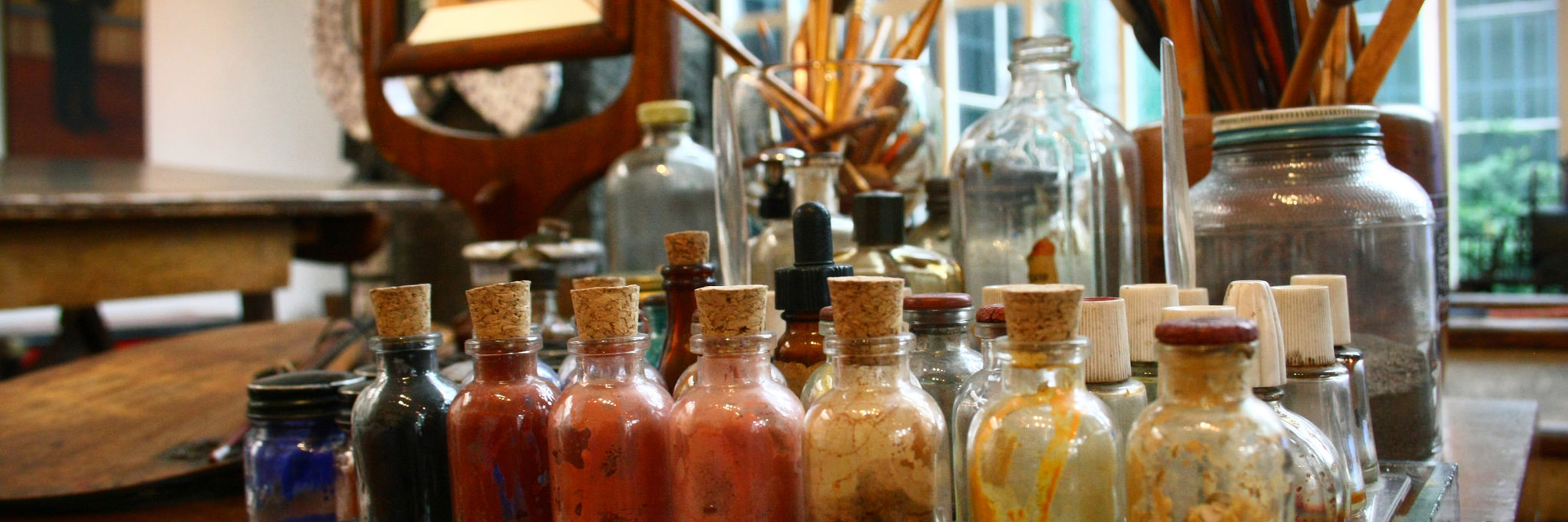 Frida Kahlo's studio with pigment jars and art materials at the Frida Kahlo Museum (Casa Azul) in Mexico City. 