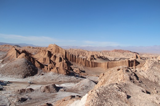 Craggy ochre ridges and salt-swept ground define the surreal terrain of Moon Valley in Chile's Atacama Desert. 