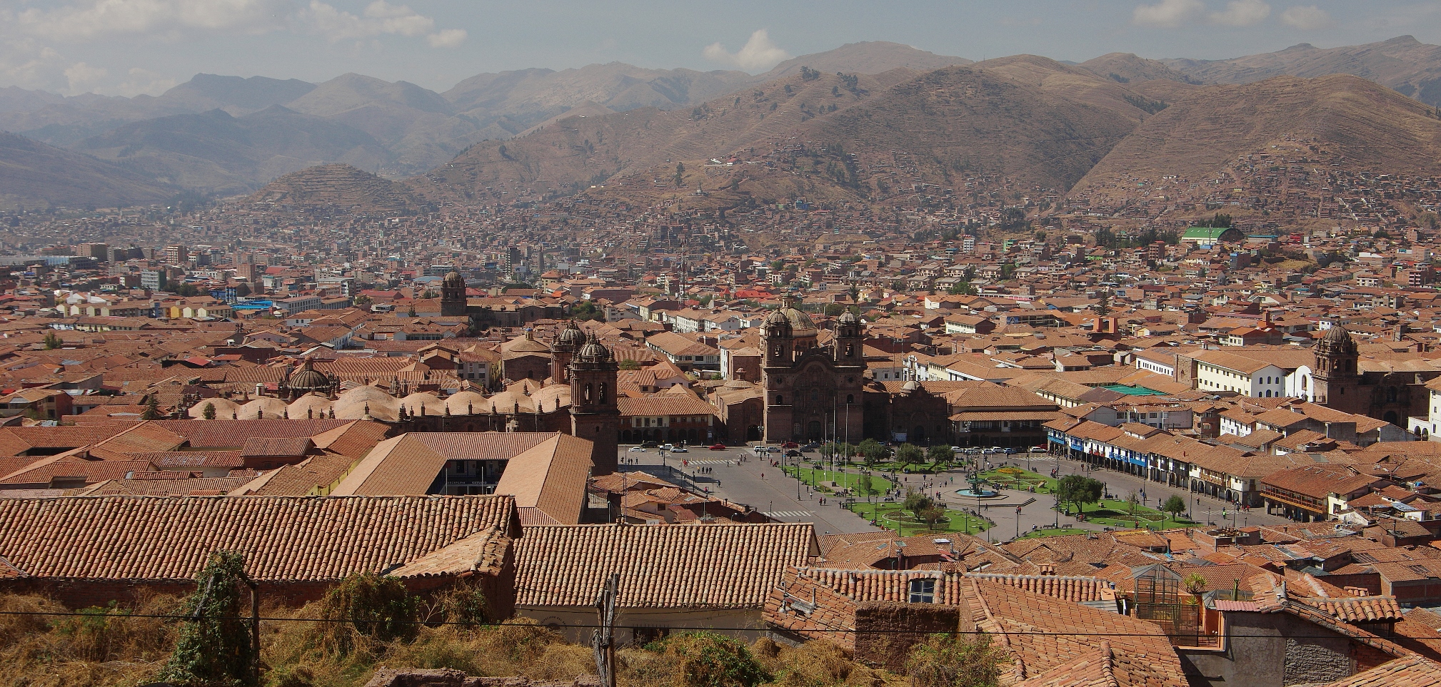 The rooftops of Cusco stretch beneath the Andes, echoing Inca and colonial legacy. 