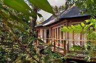 A secluded suite at Kasiiya Lodge blends luxury and nature, nestled in the heart of Costa Rica's tropical wilderness. 