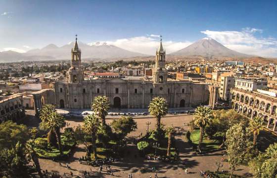 Arequipa's Plaza de Armas and Cathedral with El Misti volcano in the distance.