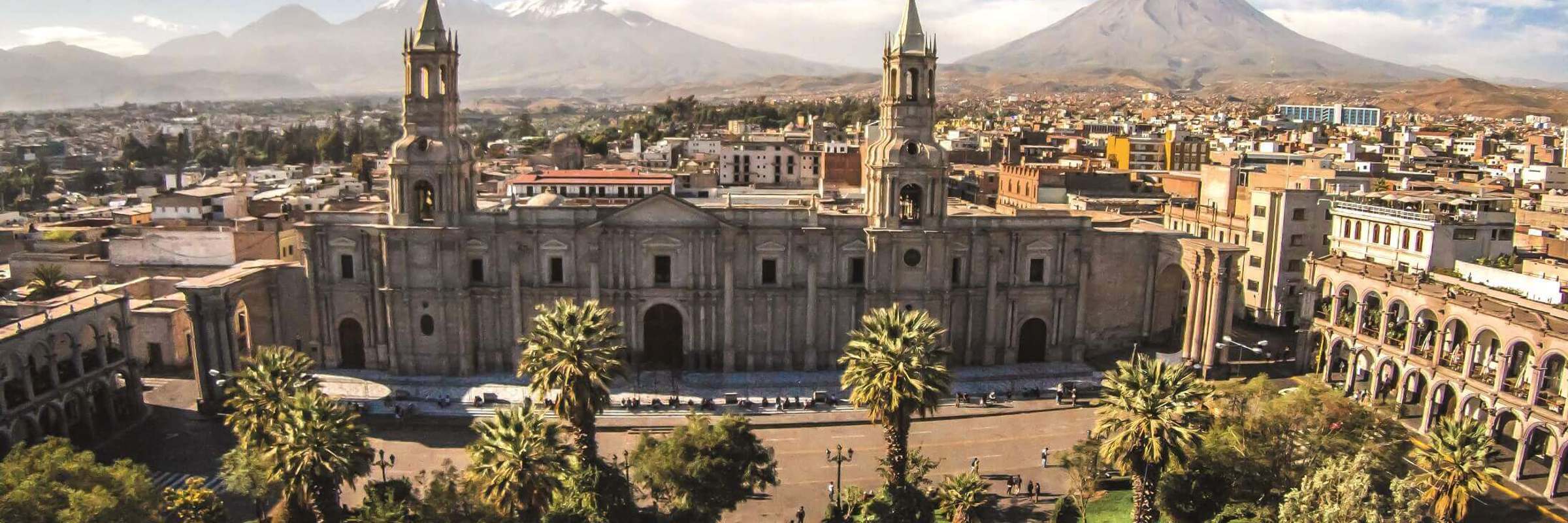 Arequipa's Plaza de Armas and Cathedral with El Misti volcano in the distance.