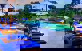Chaa Creek Infinity Swimming Pool Night Carousel 0