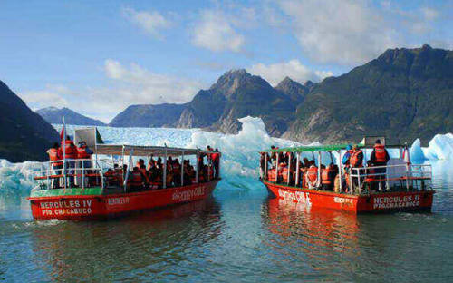 Smaller boats take you right up to the glacier, close enough to touch