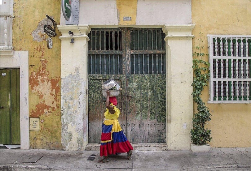 where to visit in Colombia - woman in Cartagena