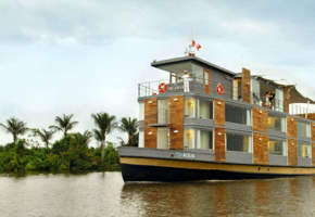 Amazon river cruise boat near Iquitos, Peru, offering rainforest exploration. 