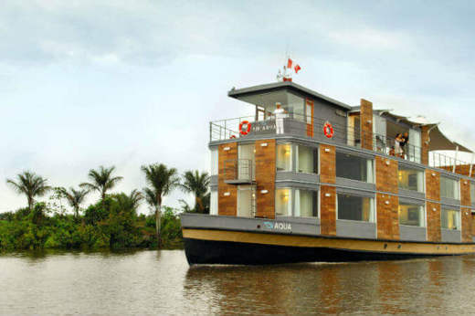 Amazon river cruise boat near Iquitos, Peru, offering rainforest exploration. 