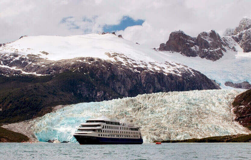 Sail close up to awe-inspiring glaciers as they crash into the sea