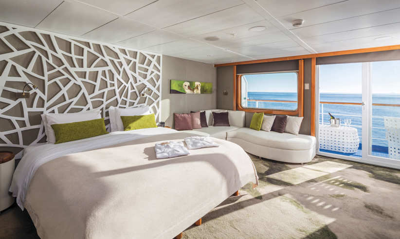 A stunning balcony suite with floor to ceiling windows