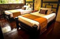 Twin room at a Tambopata Amazon lodge with jungle views. 
