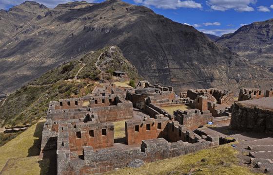 Ancient Inca stonework and sweeping mountain views define the stunning ruins of Pisac in Peru's Sacred Valley. 