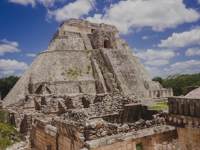 Pyramid of the Magician at Uxmal, a UNESCO World Heritage Mayan site with dramatic architecture in Yucatan, Mexico. 