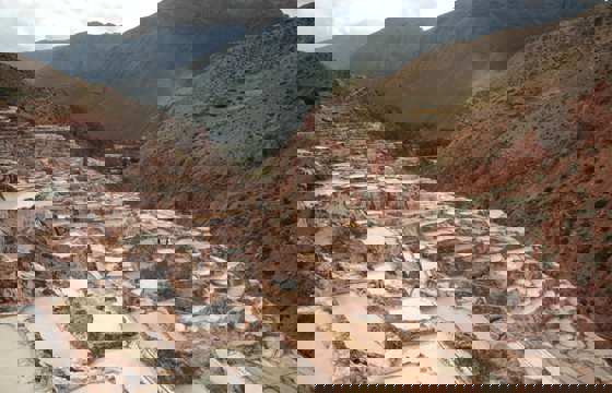 Terraced salt ponds of Maras in Peru's Sacred Valley, a unique historical and cultural site. 