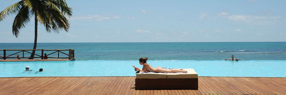 Unwind by the pool reading
