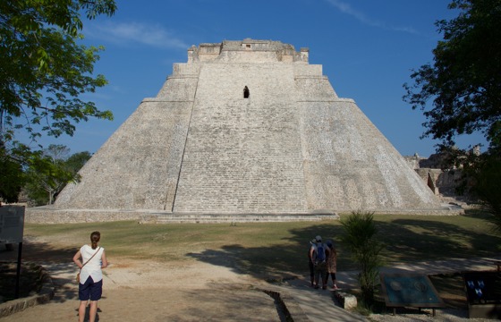 The towering Pyramid of the Magician in Uxmal, an iconic Mayan archaeological site in Mexico's Yucatan Peninsula. 