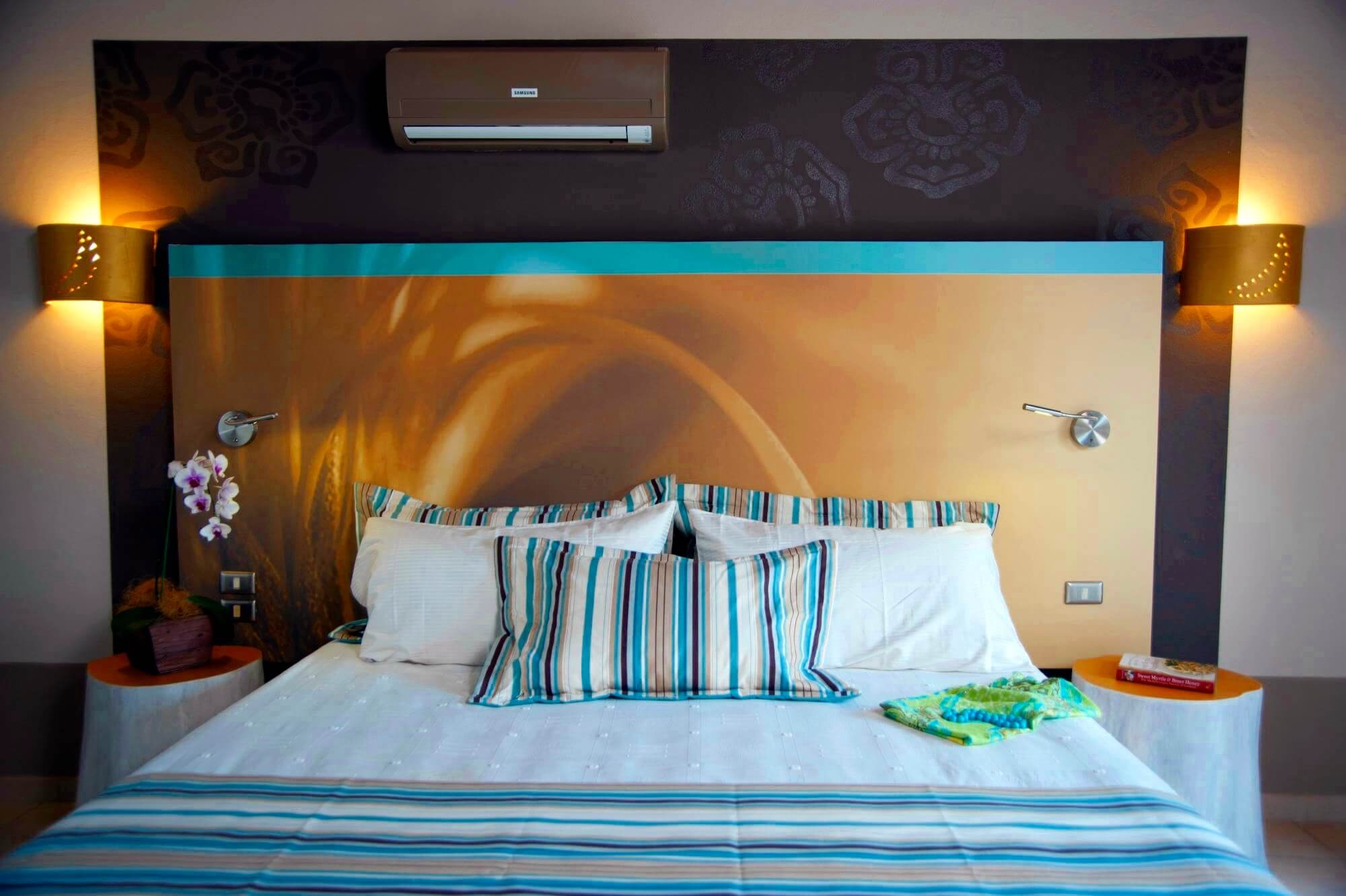A cozy, stylish room at Cala Luna blends tropical charm with modern comfort in Costa Rica. 