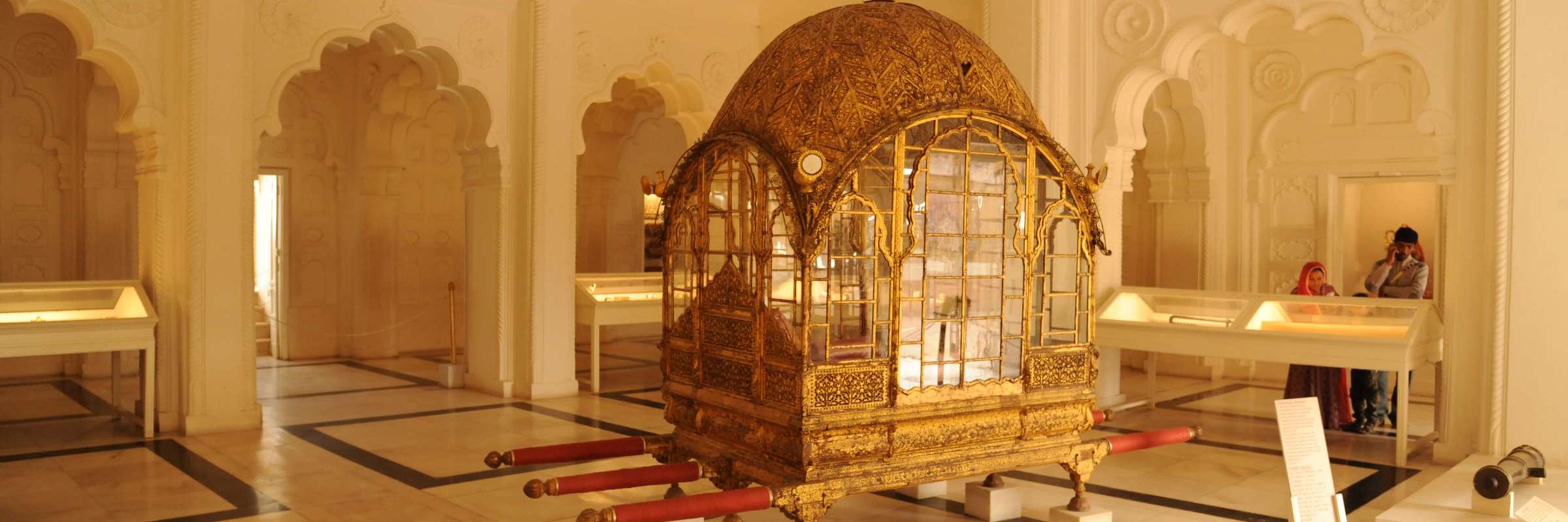 Asia, India - Ornate golden palanquin displayed in the City Palace Museum, Rajasthan. 