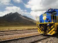 The Belmond Andean Explorer luxury train traveling through the Peruvian Andes- South America's most iconic rail journey. 