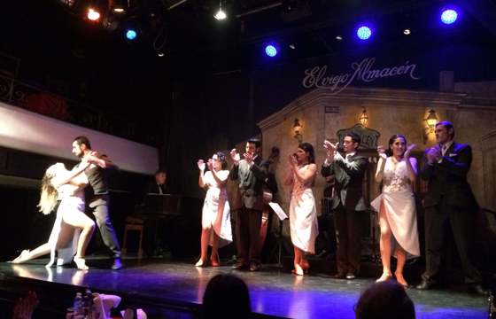 Tango dancers perform on stage at El Viejo Almacen in Buenos Aires, a top cultural experience in Argentina. 