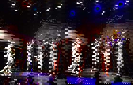 Tango dancers perform on stage at El Viejo Almacen in Buenos Aires, a top cultural experience in Argentina. 