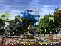 Pleasant squares with gardens, shade and monuments