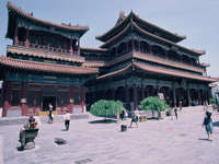 China- visitors explore Beijing's Lama Temple, a striking example of traditional Chinse and Tibetan architecture. 
