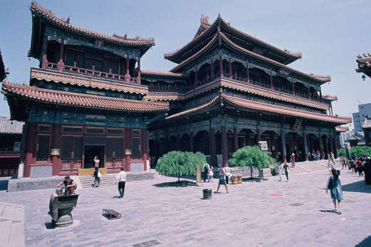 China- visitors explore Beijing's Lama Temple, a striking example of traditional Chinse and Tibetan architecture. 