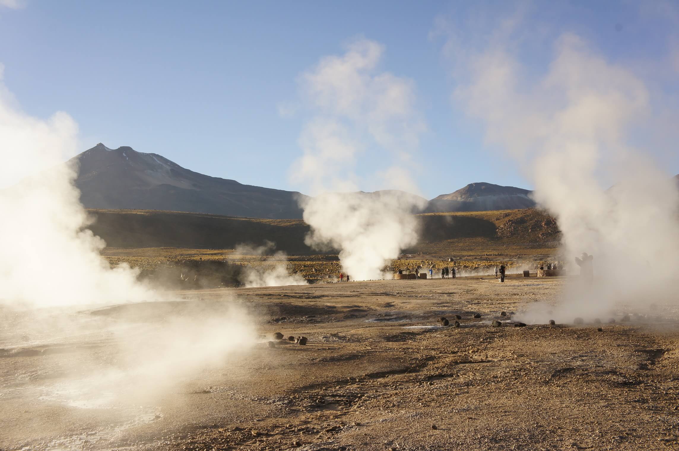 Steam rises from El Tatio Geysers near San Pedro de Atacama, a surreal geothermal field in Chile's Altiplano. 