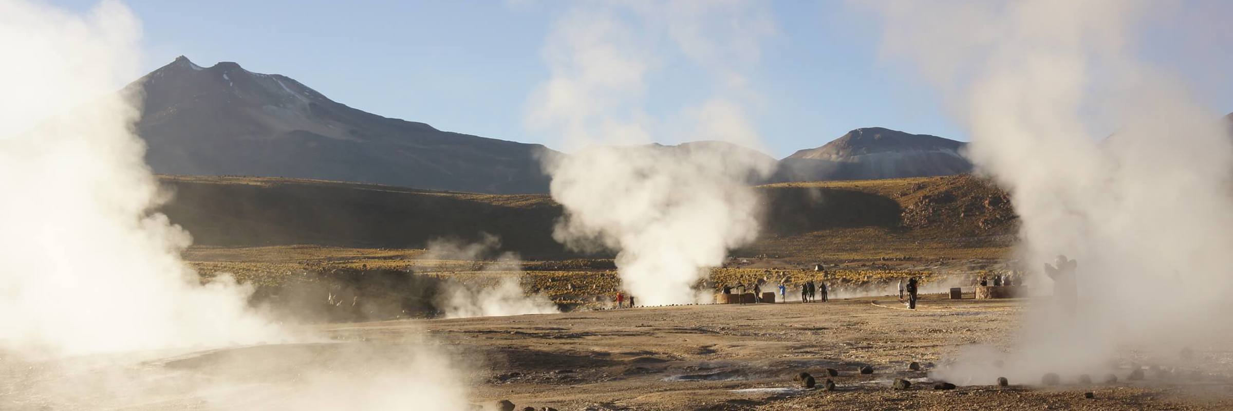 Steam rises from El Tatio Geysers near San Pedro de Atacama, a surreal geothermal field in Chile's Altiplano. 