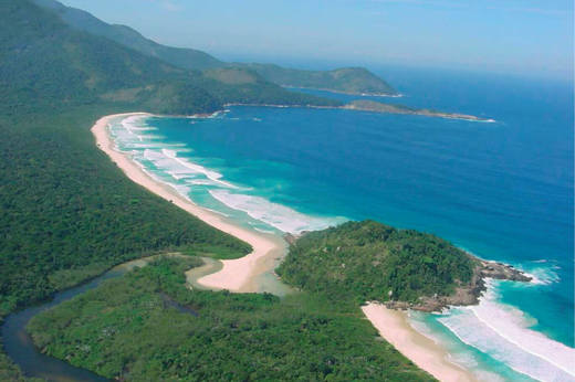 Aerial view of sweeping beaches and forested coastline on Ilha Grande.